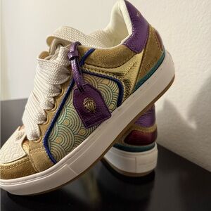 Kurt Geiger Gold and Purple Sneakers 
No tags but Never worn
